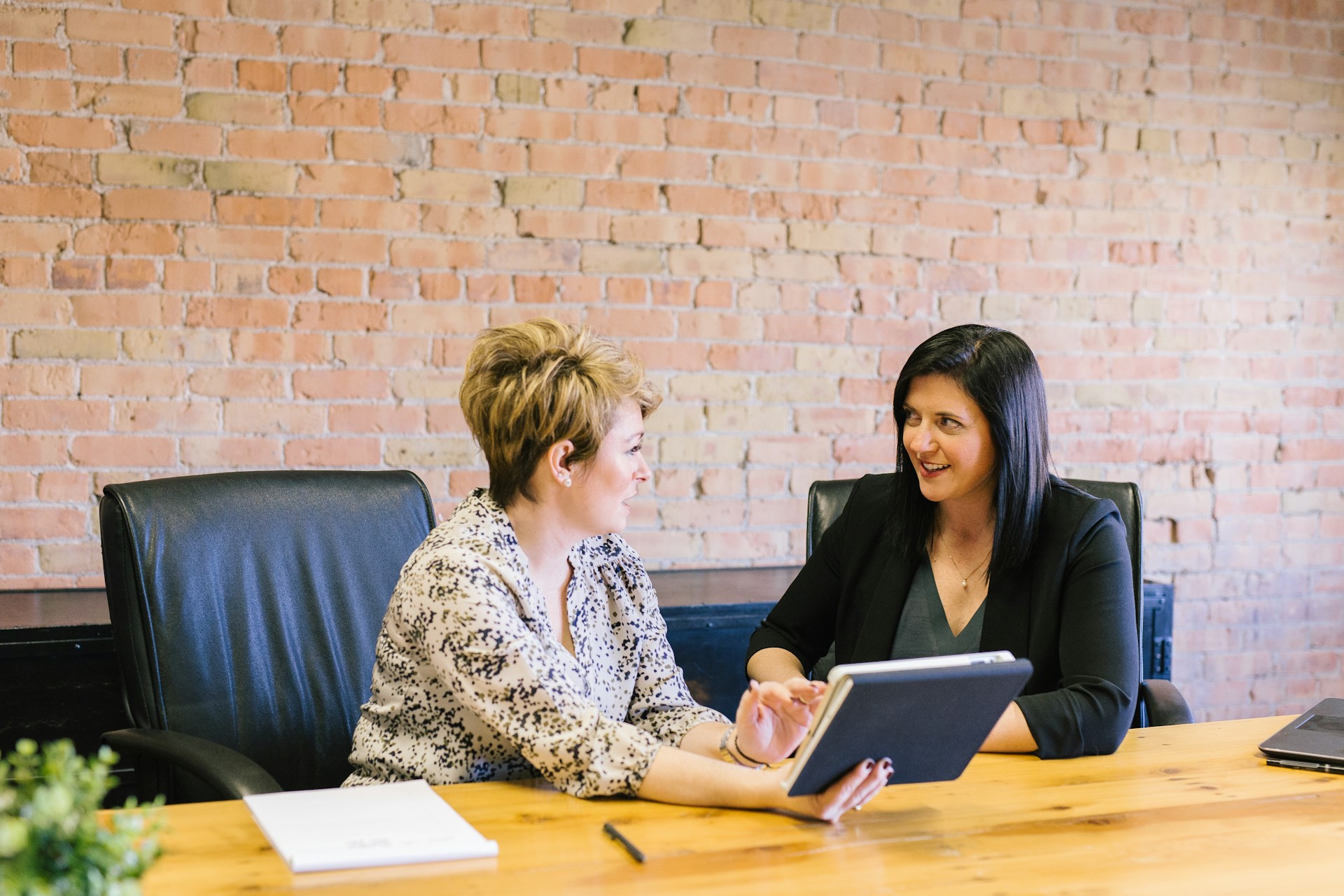 Savvy People accounting career specialists with professional young accountant arms folded and smiling at the camera